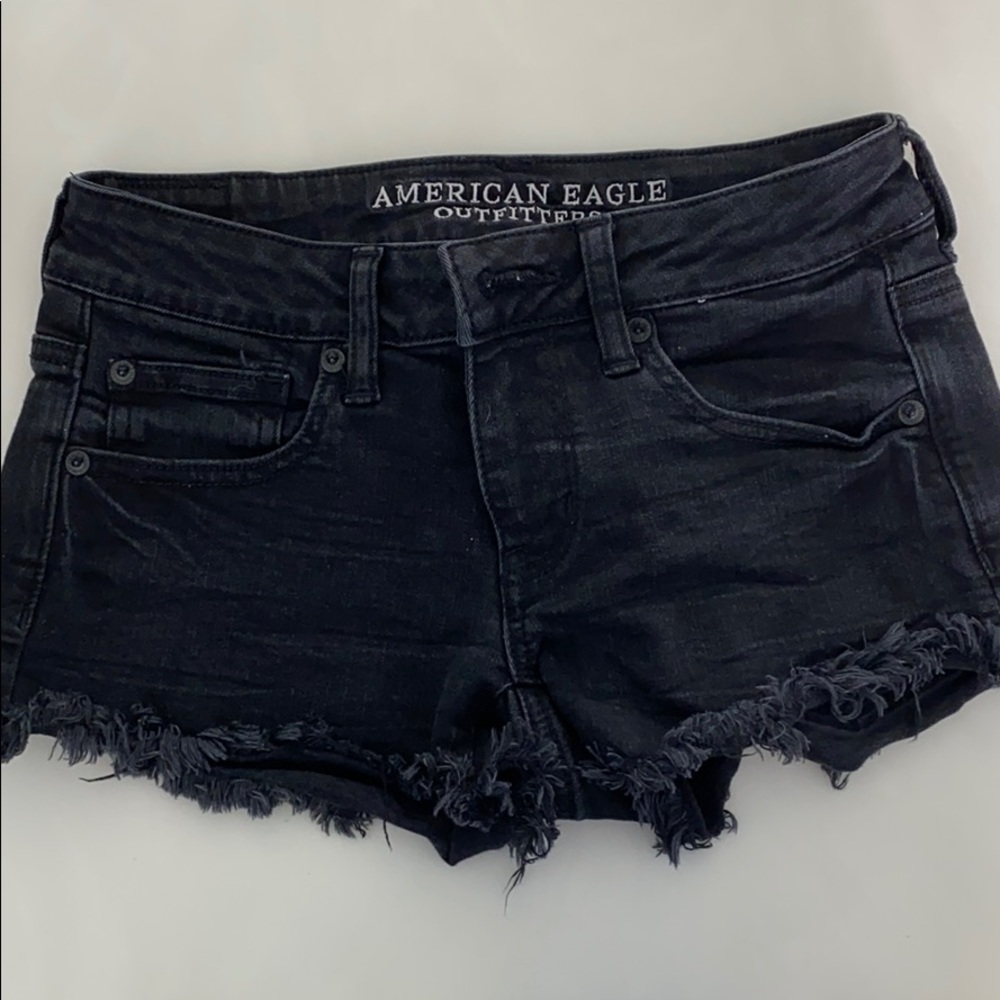 black cutoff shorts